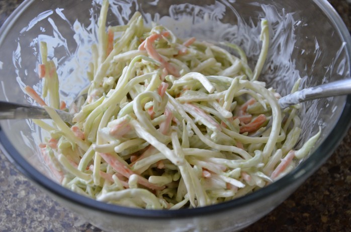Creamy broccoli slaw with olive oil mayo, apple cider vinegar, freshly ground pepper, and a generous pinch of coconut sugar crystals.